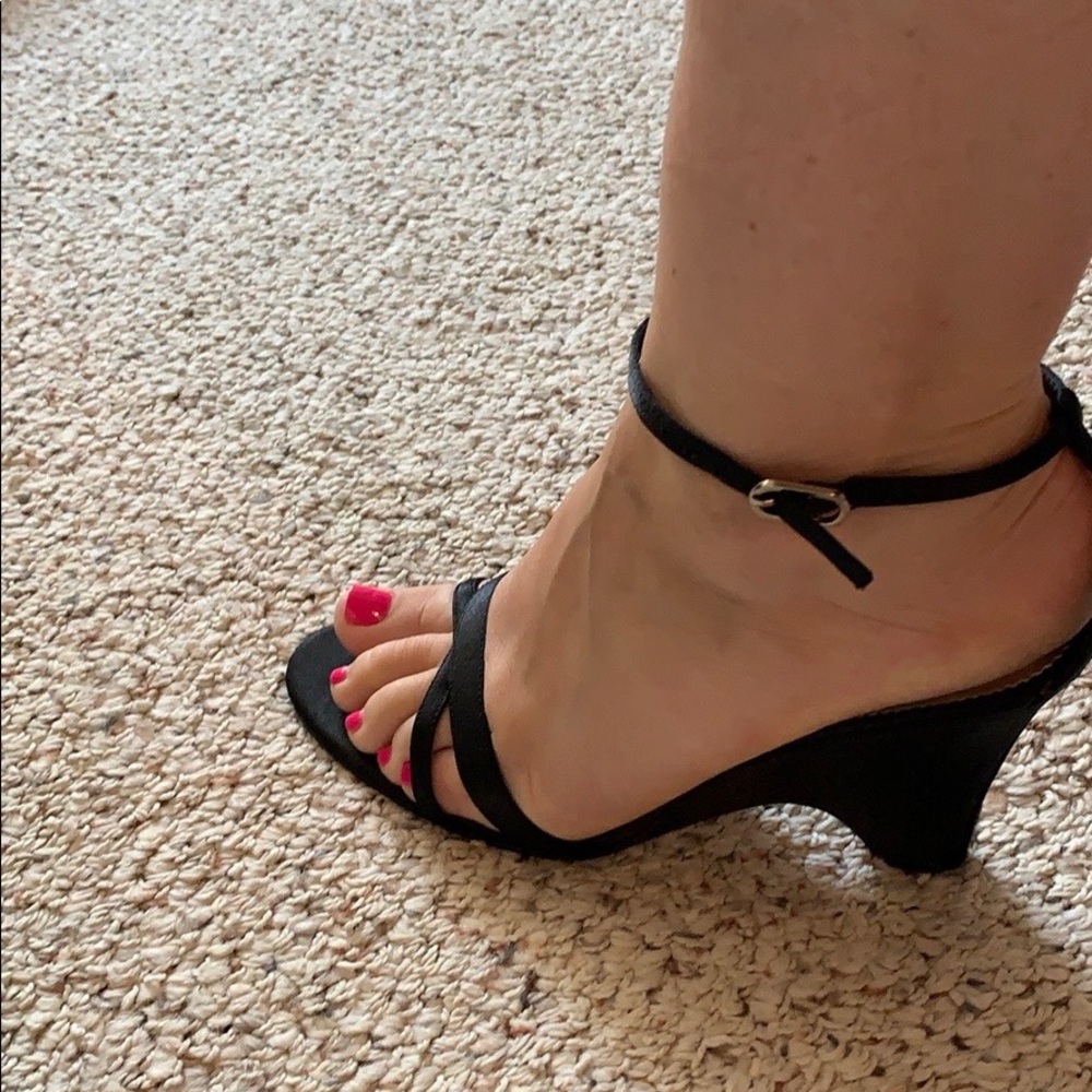 Black wedge heels.